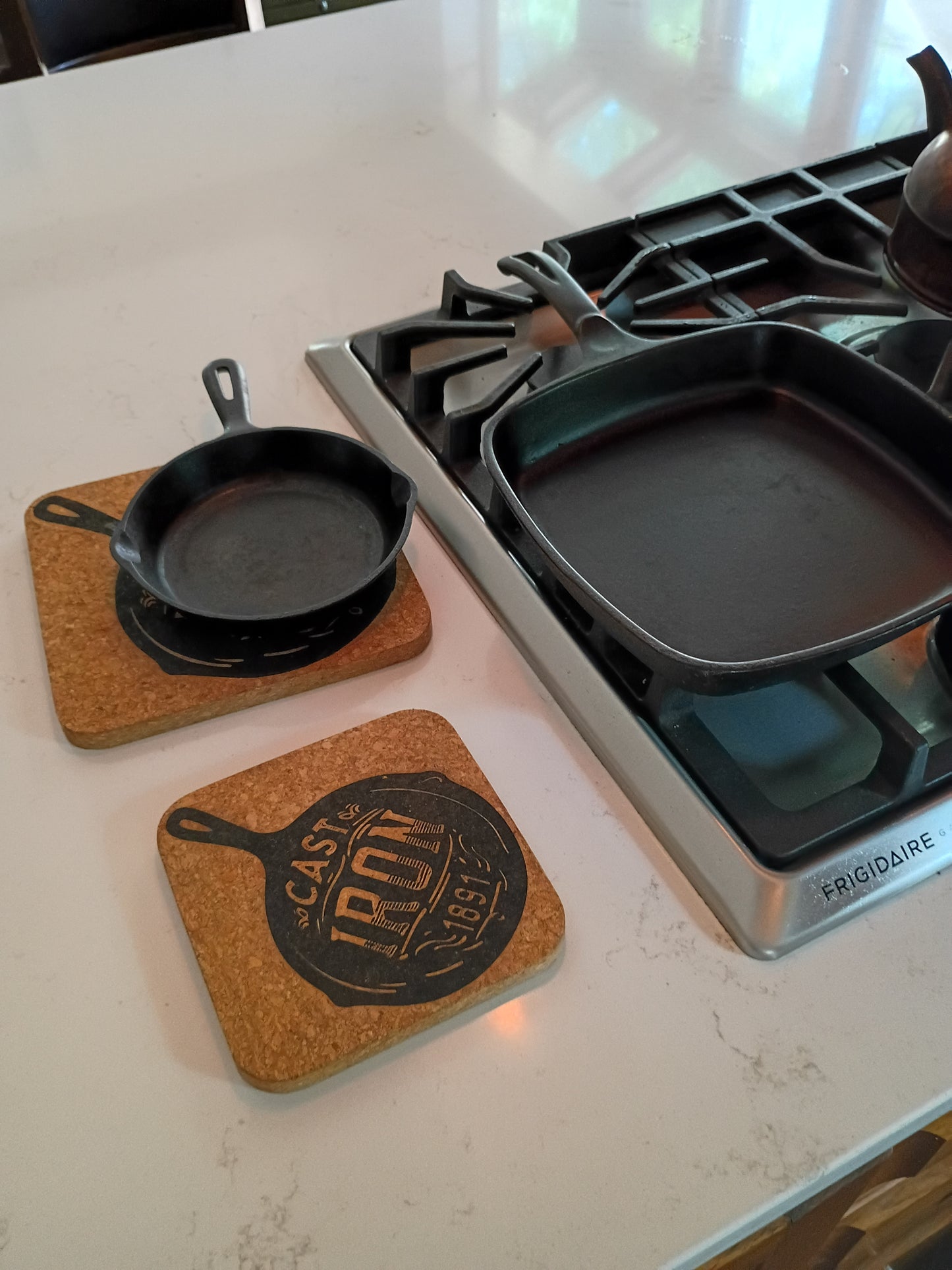 Cast Iron 1891 Cork Trivet Set
