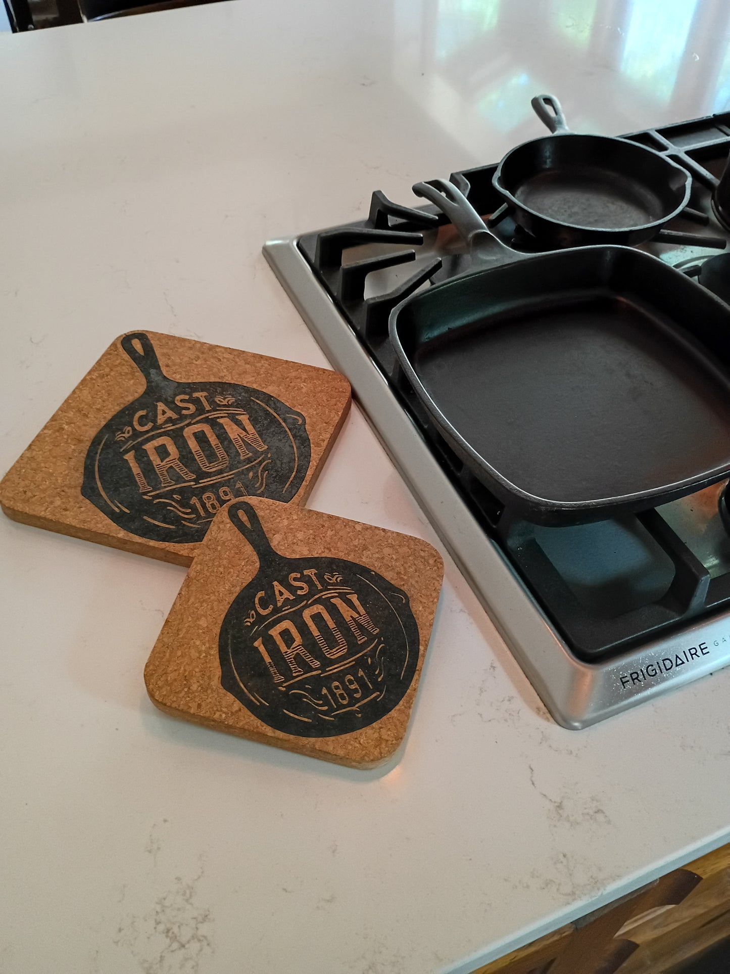 Cast Iron 1891 Cork Trivet Set
